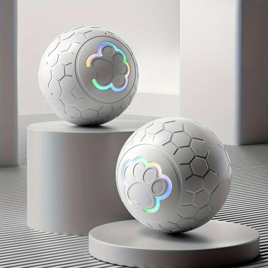 GlowMotion Smart Pet Ball two grey lit up sitting on display stands