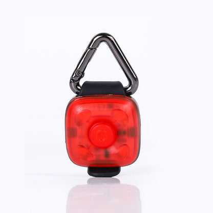 Red LED pet light with a carabiner on a white background