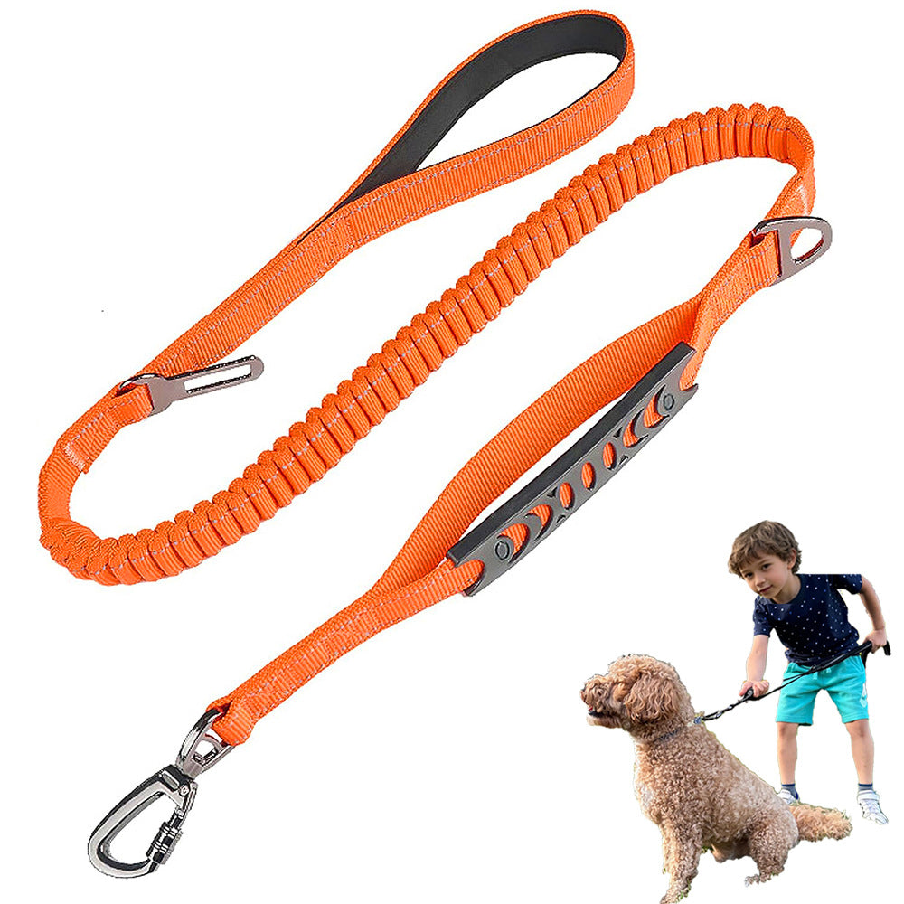 Orange dog leash with metal clip, child holding it with a dog on a white background